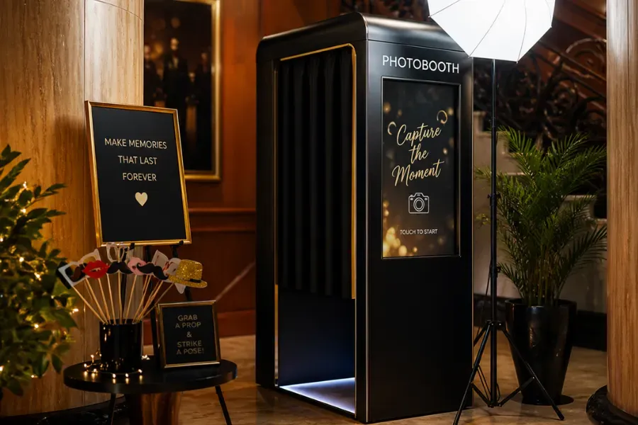 Guest taking a source photo for AI photobooth face swap and image generation