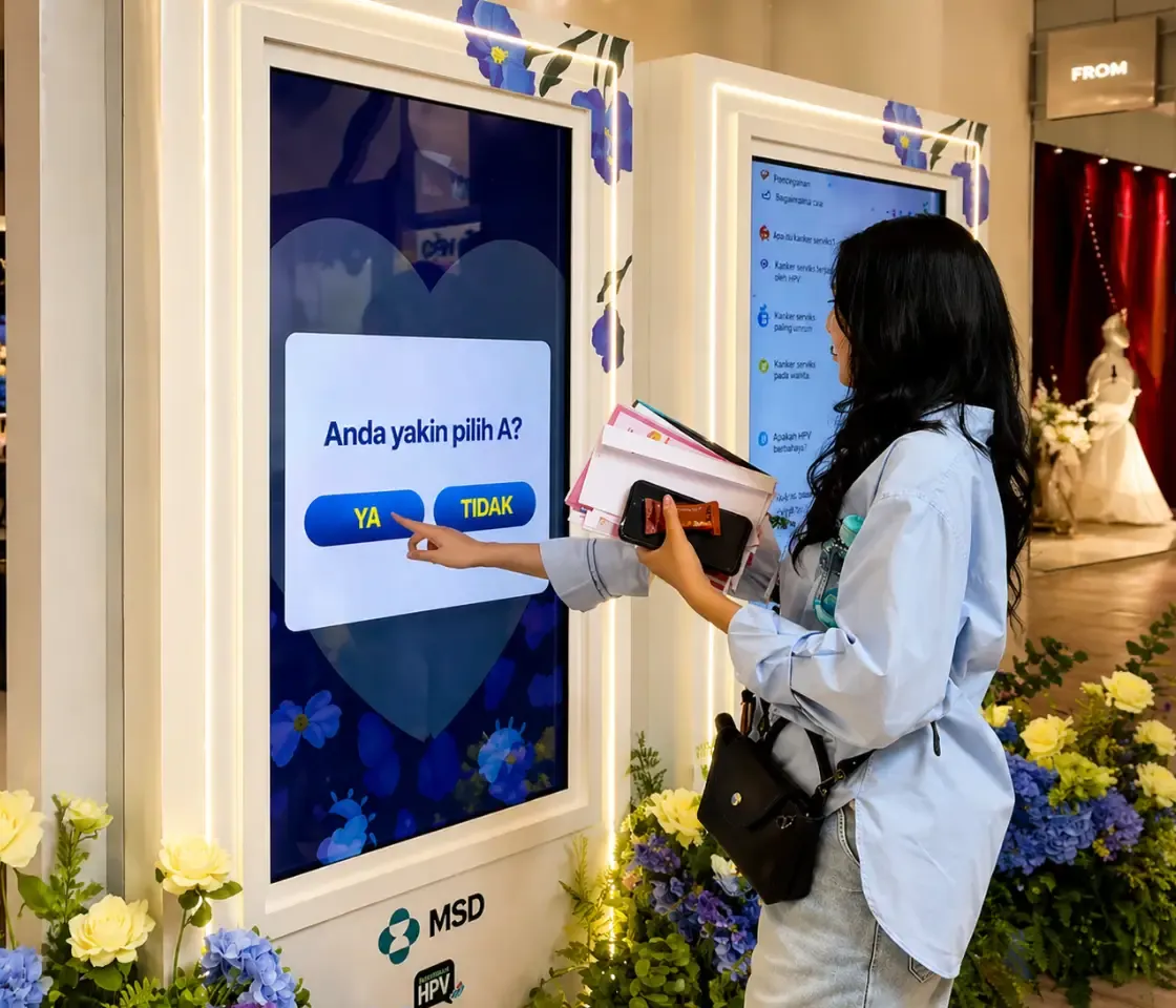 People playing quiz game at an event booth