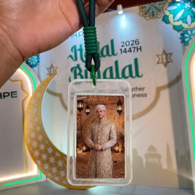 Themed AI photobooth photo card with event branding, decorative background, and shareable visual output