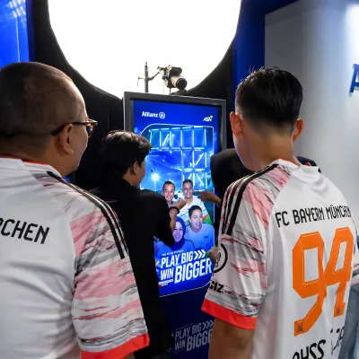 Event guests interacting with the Allianz real-time LED photobooth digital signage at ASN Kick Off Meeting 2026